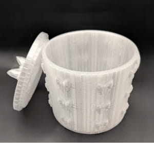 White 3D printed bow storage tub with matching lid, featuring raised bow details around the sides and a decorative bow handle. Perfect for storing jewellery, trinkets, keepsakes and small accessories.