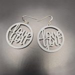 White Love You statement earrings with elegant script lettering and silver hooks
