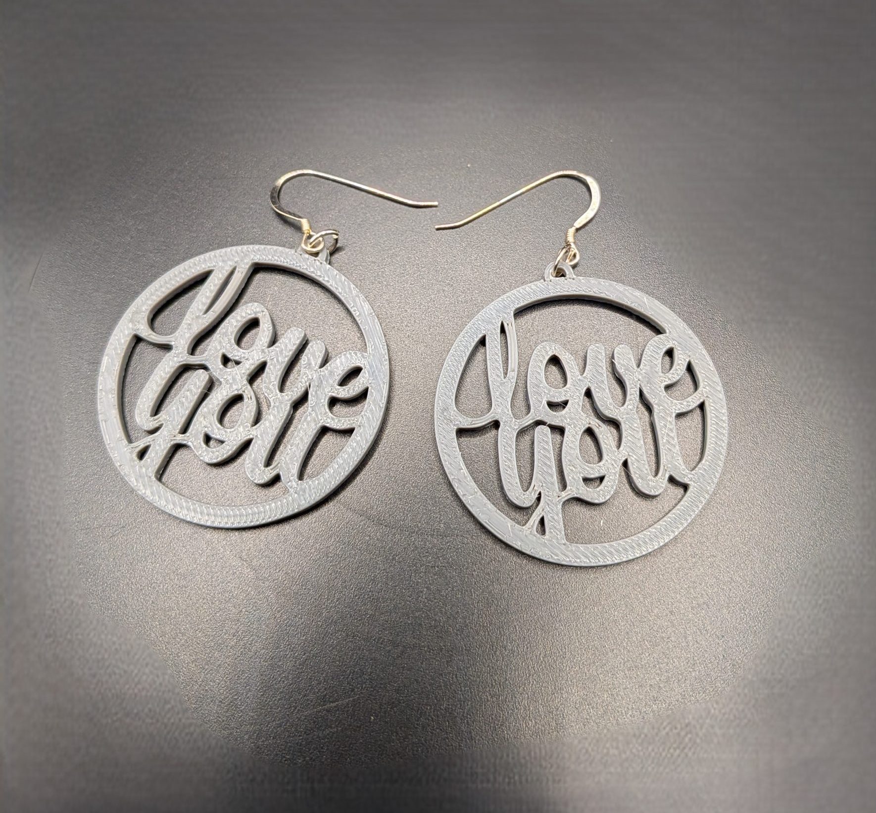 Love You Earrings Bitsy Boutique White Love You statement earrings with elegant script lettering and silver hooks
